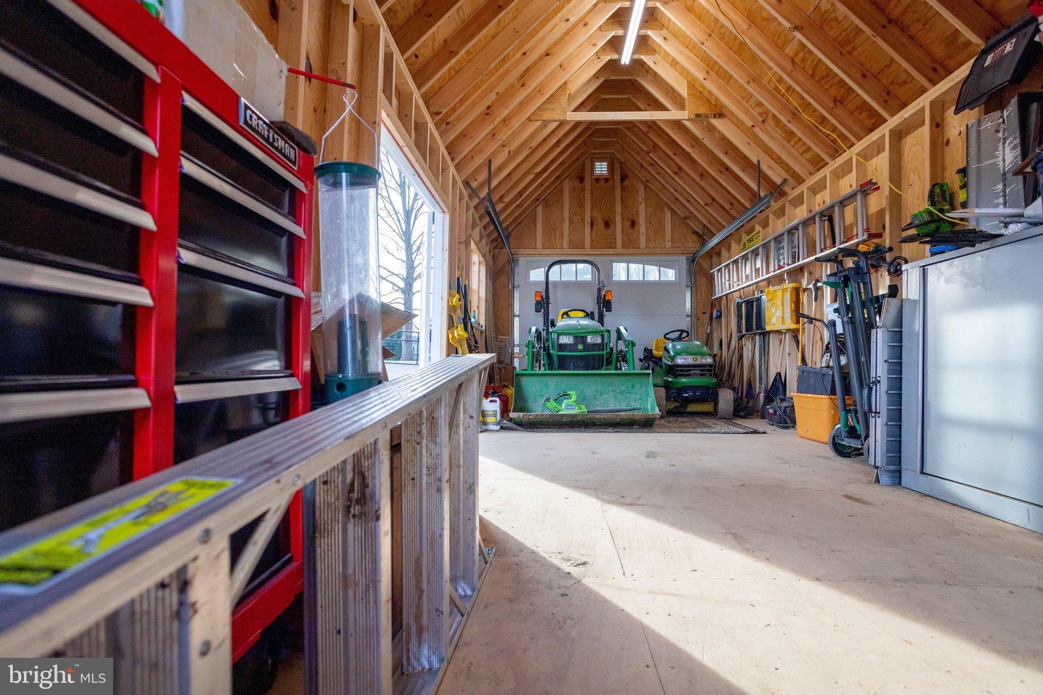 17207 Hunter Green Road Upperco, MD 21155 - Photo 33 of 56 Interior of shed. Plenty space for tractors/lawn
