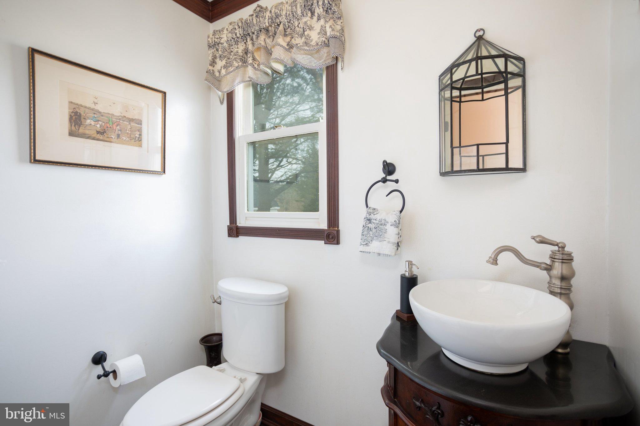 17207 Hunter Green Road Upperco, MD 21155 - Photo 5 of 56 Half BA off of the kitchen, next to the laundry rm