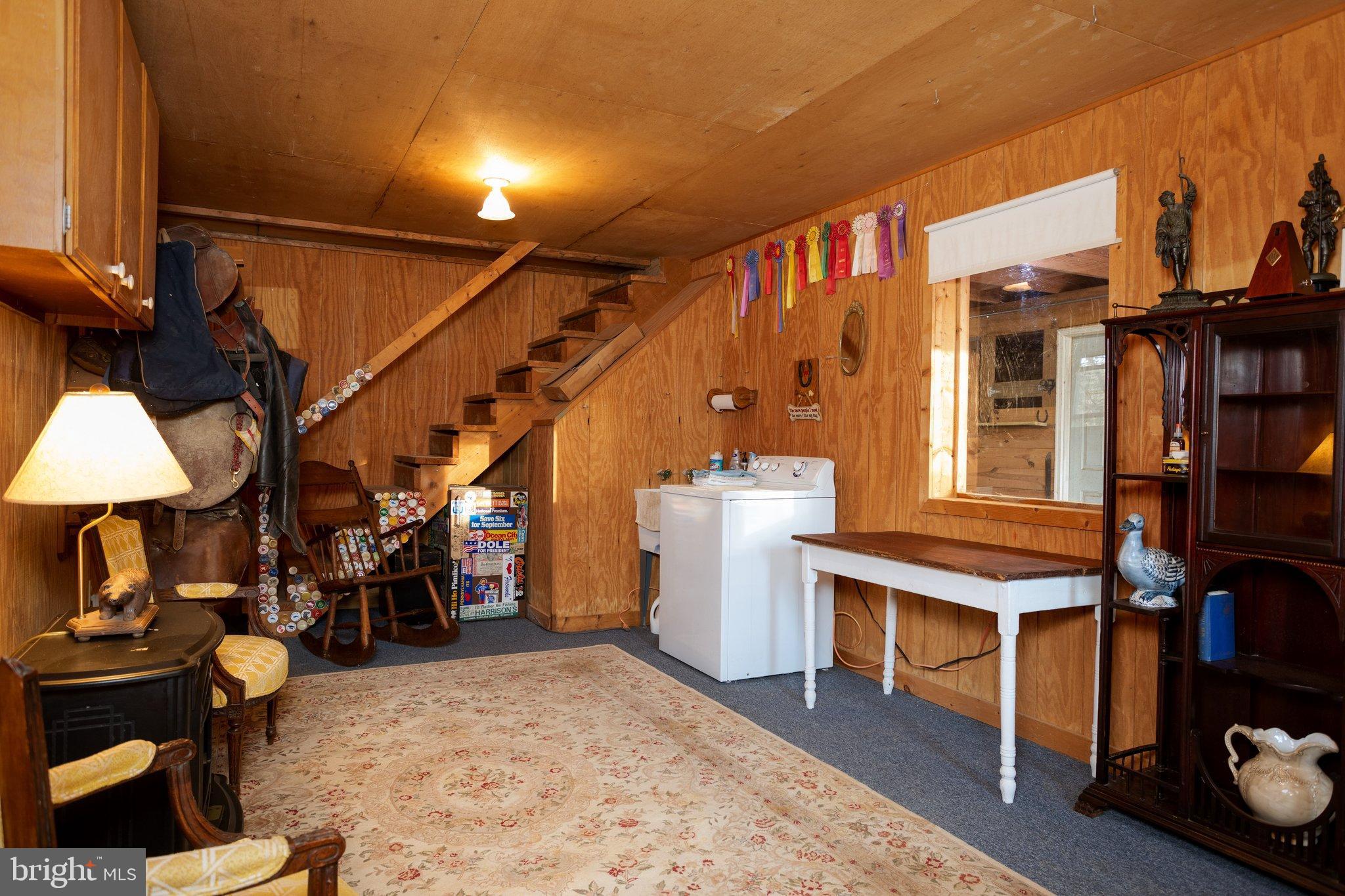 17207 Hunter Green Road Upperco, MD 21155 - Photo 44 of 56 Large heated tack room with view of stalls.