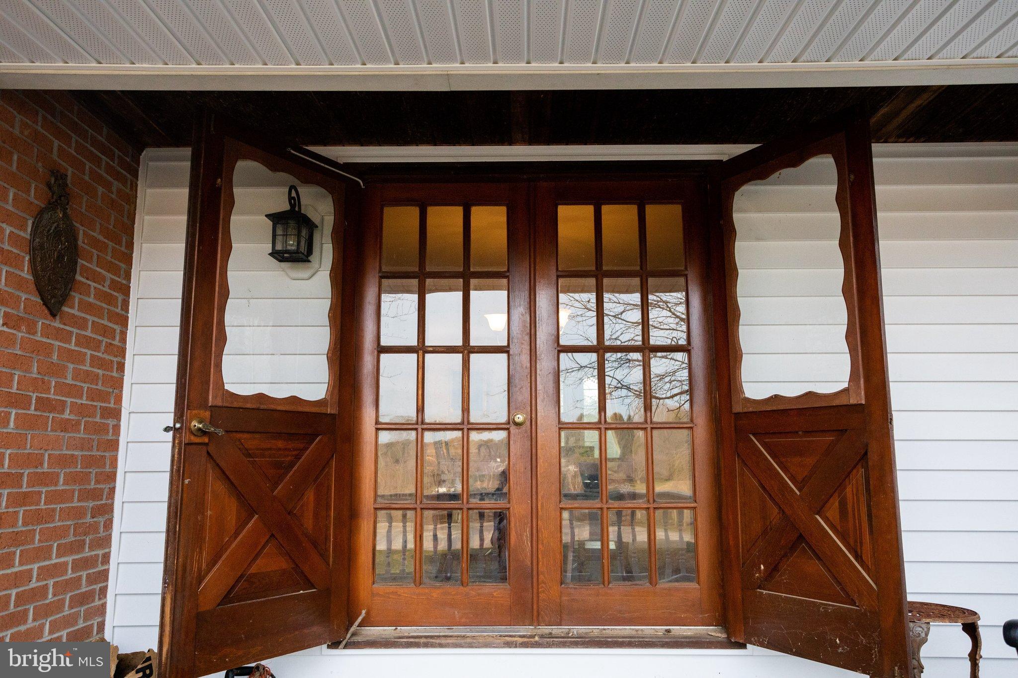 17207 Hunter Green Road Upperco, MD 21155 - Photo 10 of 56 French Doors leading out to deck and backyard