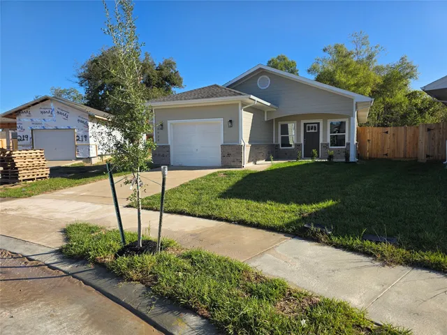 a view of a house with a garden