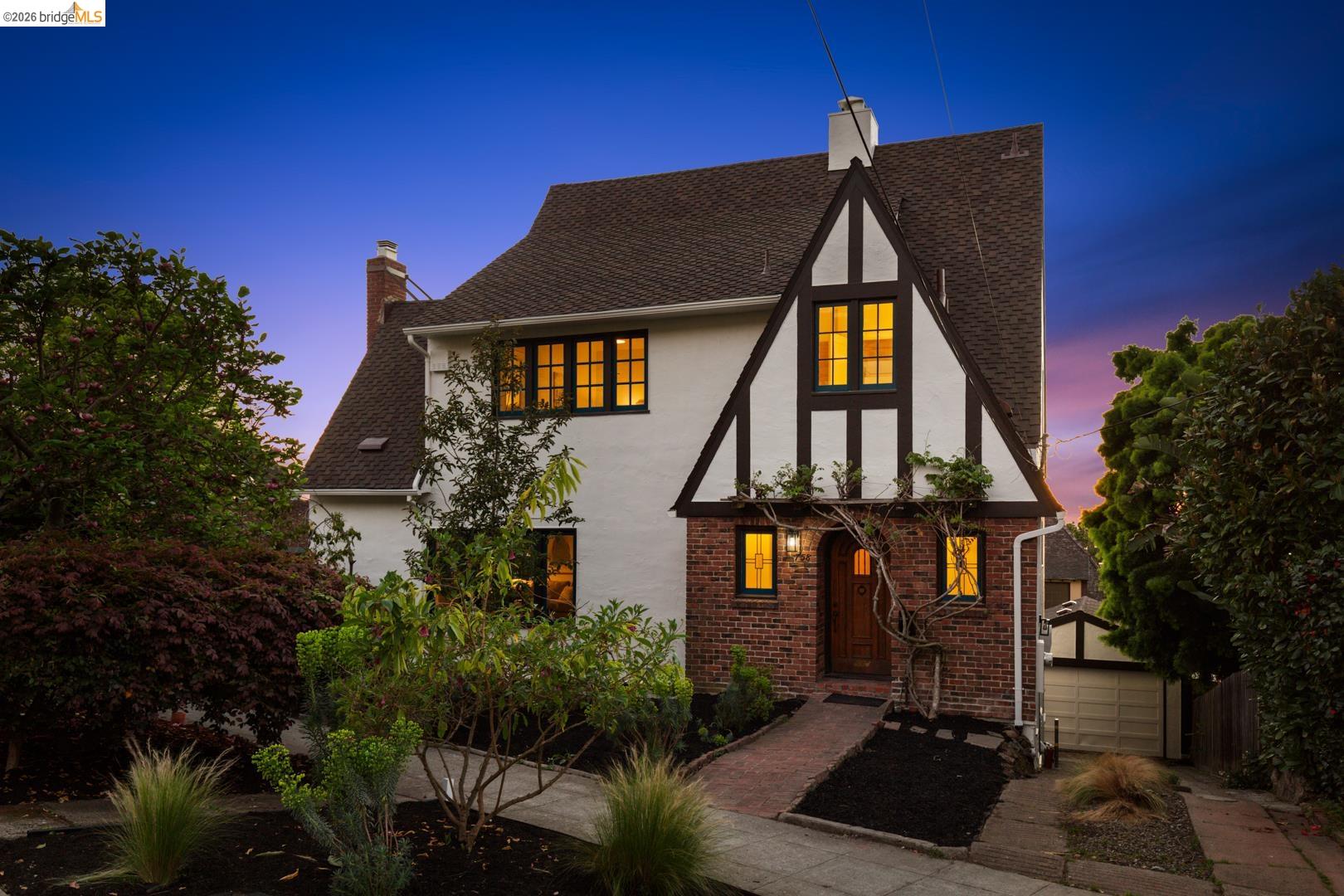 758 Spruce Street Berkeley, CA 94707 - Photo 1 of 60 English style home featuring a chimney, stucco siding, brick siding, and a shingled roof