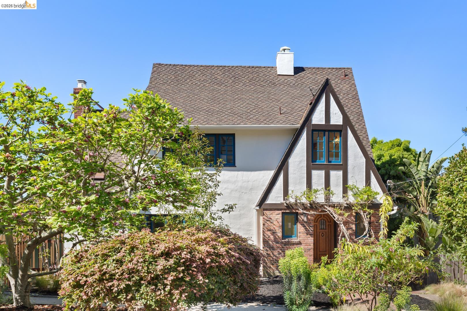 758 Spruce Street Berkeley, CA 94707 - Photo 10 of 60 View of front of house featuring a chimney, stucco siding, and a shingled roof