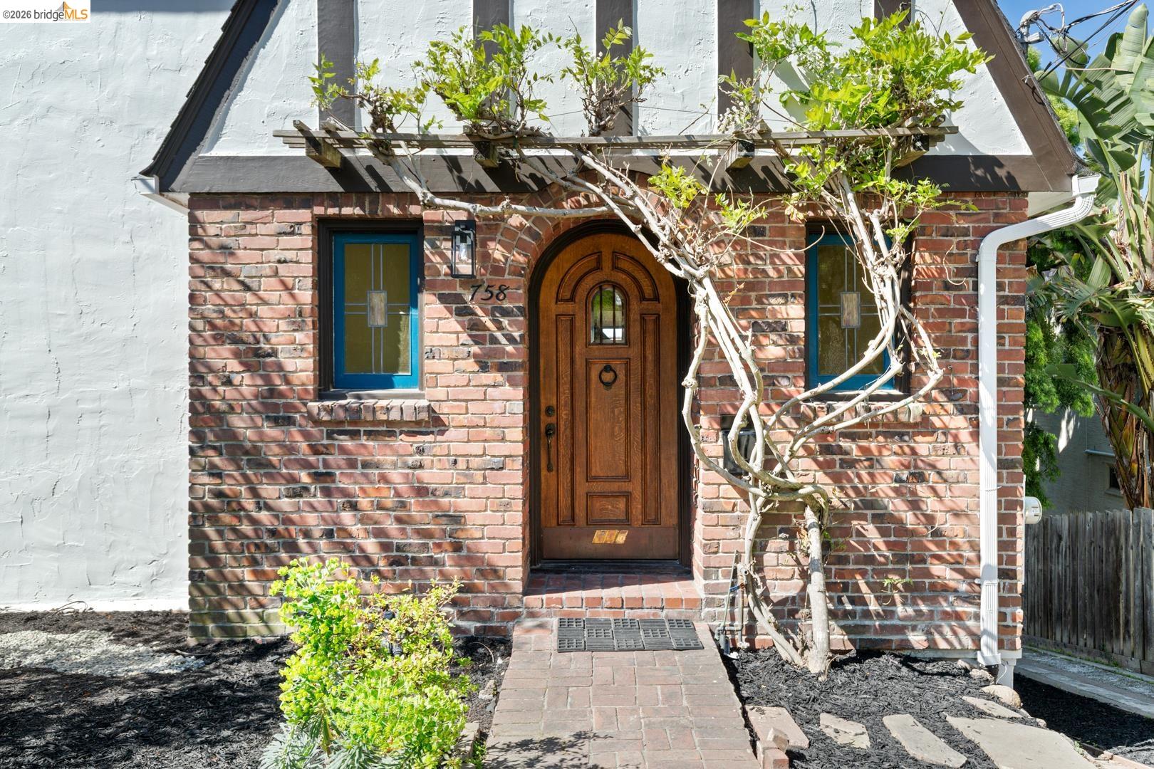 758 Spruce Street Berkeley, CA 94707 - Photo 2 of 60 View of exterior entry featuring brick siding