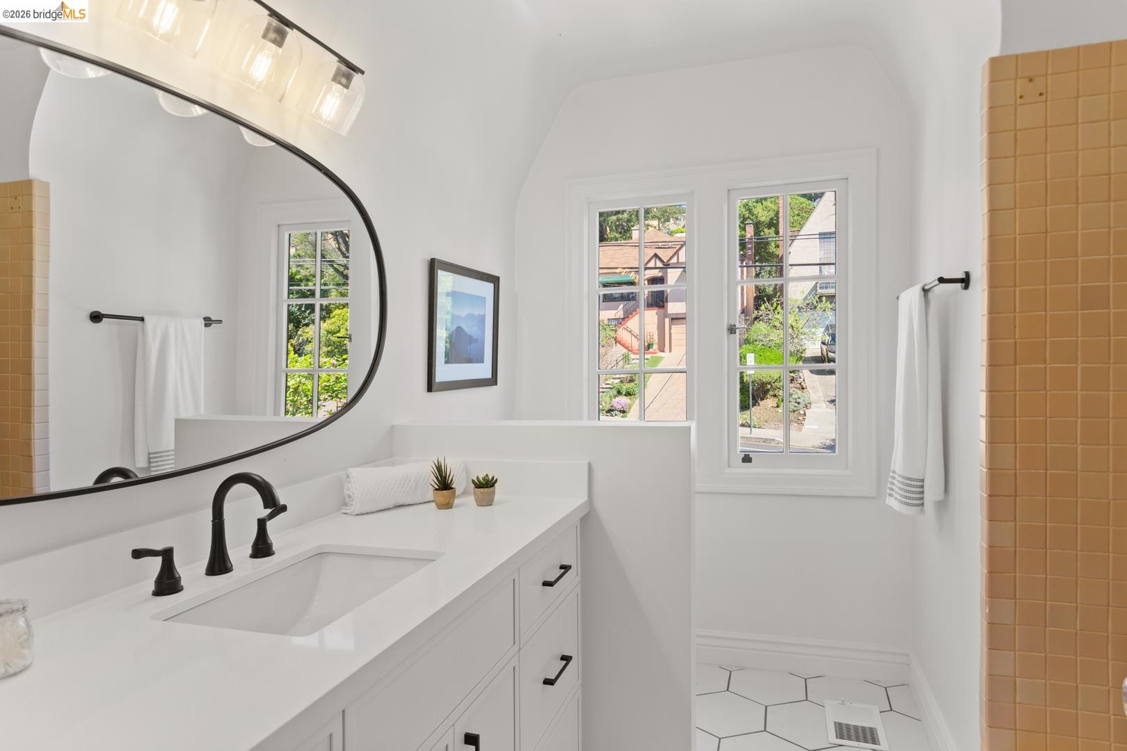 758 Spruce Street Berkeley, CA 94707 - Photo 24 of 60 Full bath with vanity, light tile patterned floors, and a shower