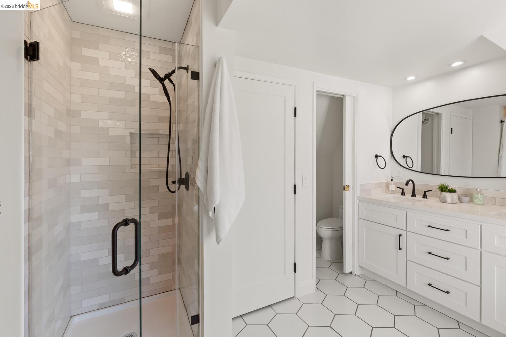 758 Spruce Street Berkeley, CA 94707 - Photo 28 of 60 Full bath with a shower stall, vanity, light tile patterned floors, and recessed lighting