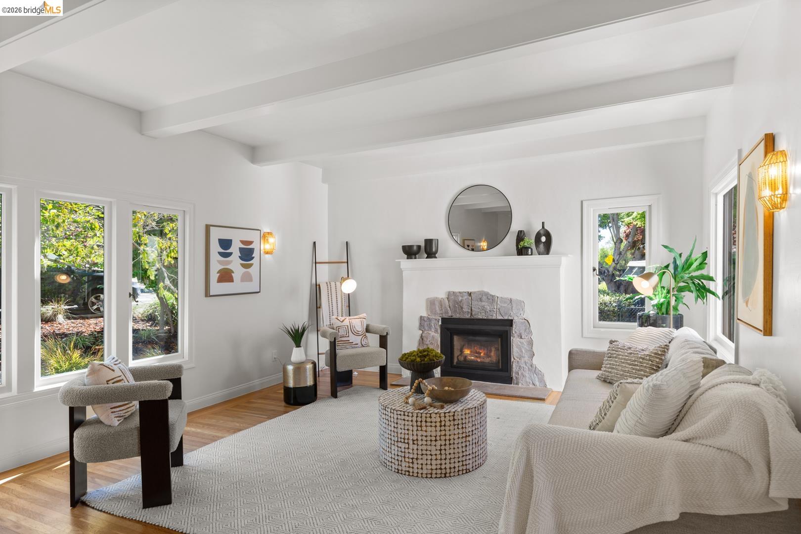 758 Spruce Street Berkeley, CA 94707 - Photo 3 of 60 Living room featuring wood finished floors and a fireplace