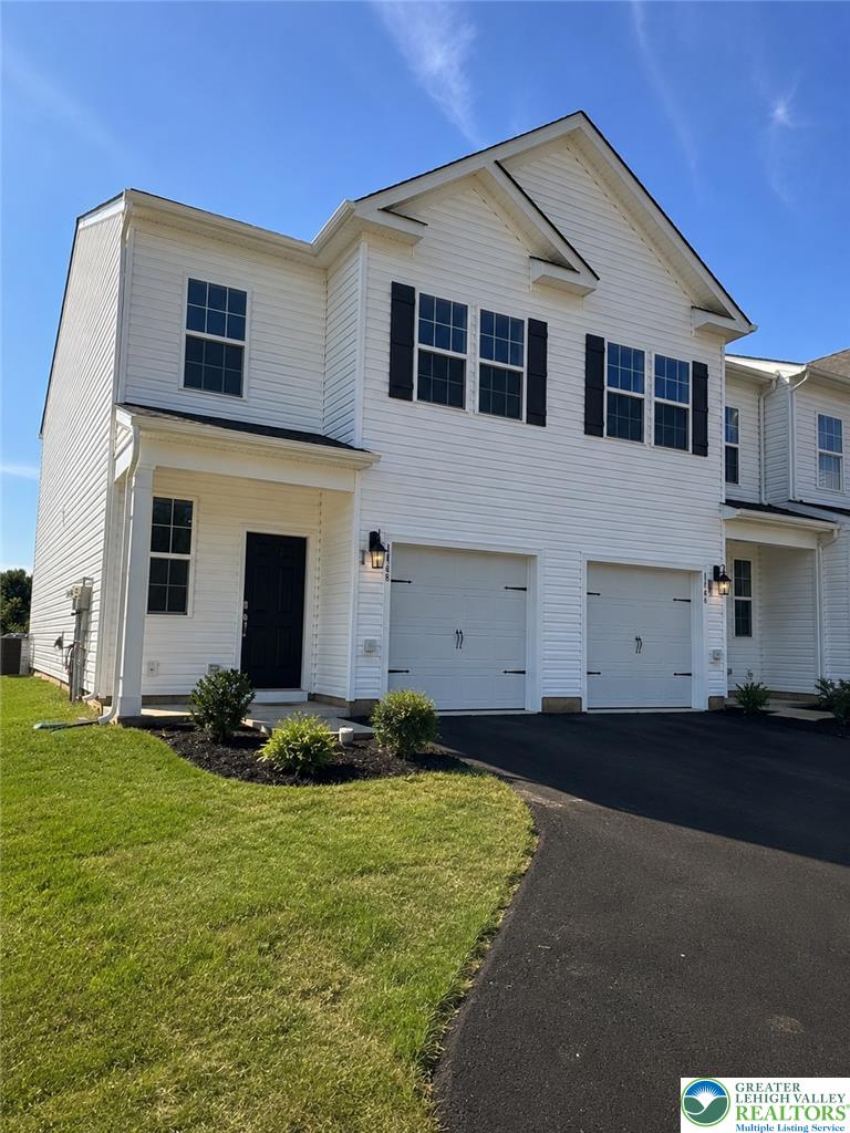 1168 Martin Road Breinigsville, PA 18031 - Photo 1 of 11 A well-maintained facade with an attached garage and a neatly landscaped front yard awaits.