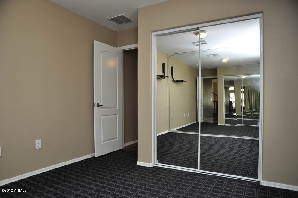 5727 South 21st Terrace Phoenix, AZ 85040 - Photo 21 of 31 C:\fakepath\Guest Bedroom-Closet