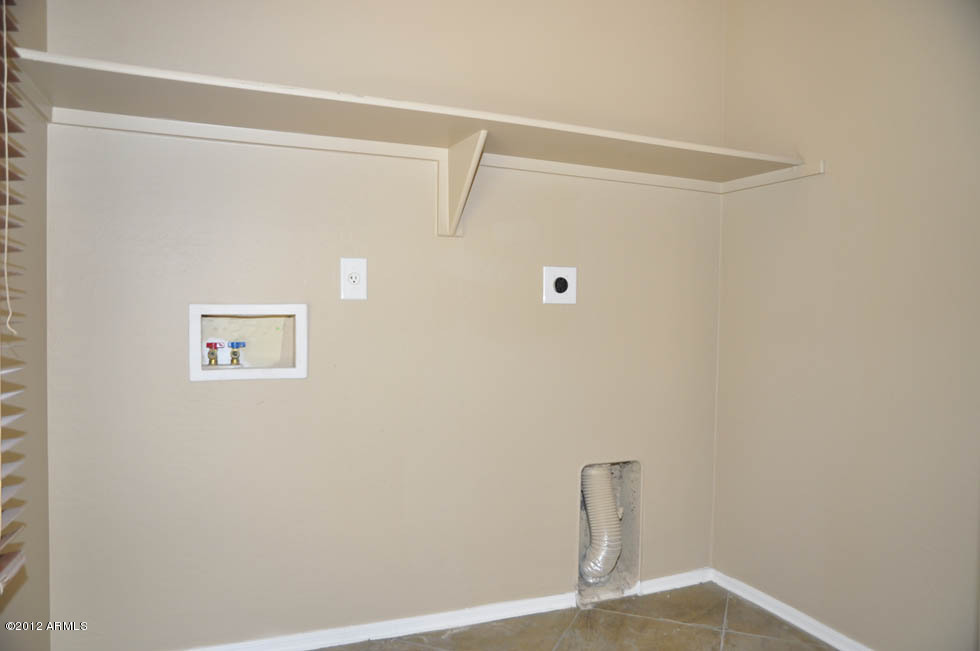 5727 South 21st Terrace Phoenix, AZ 85040 - Photo 27 of 31 C:\fakepath\Laundry Room