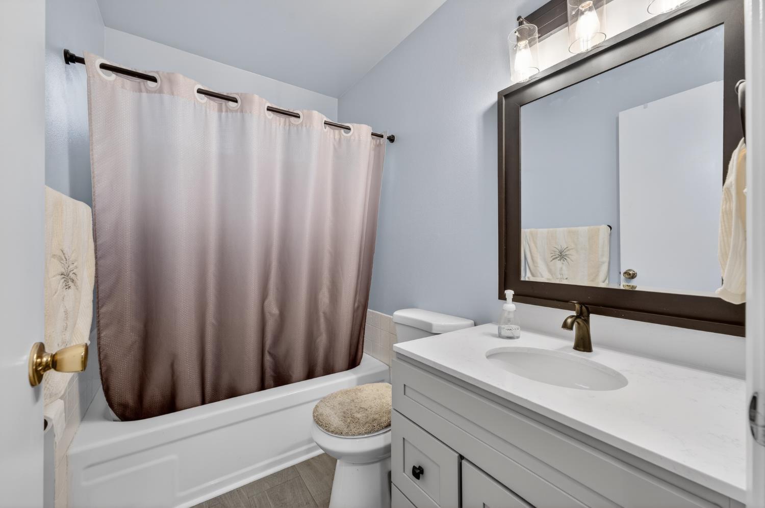 4625 Ruth Way Union City, CA 94587 - Photo 35 of 60 a bathroom with a sink and a mirror