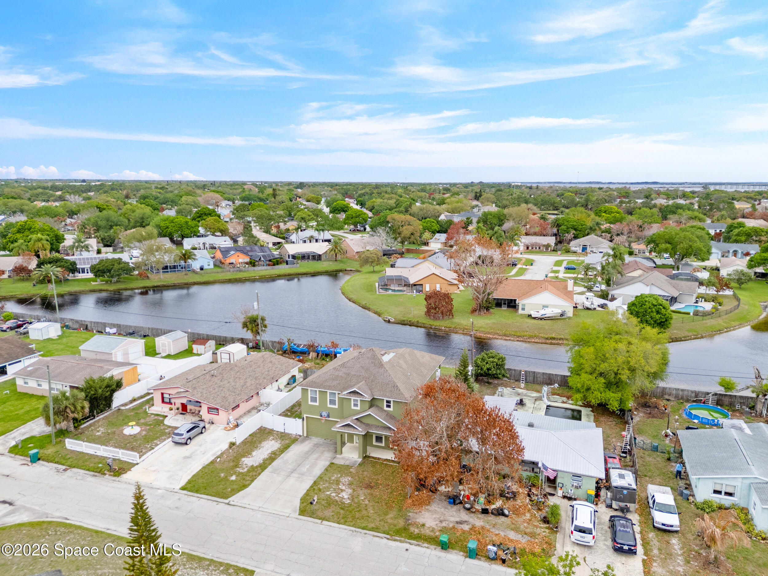 2246 Warwick Road Melbourne, FL 32935 - Photo 33 of 40 an aerial view of a houses with outdoor space