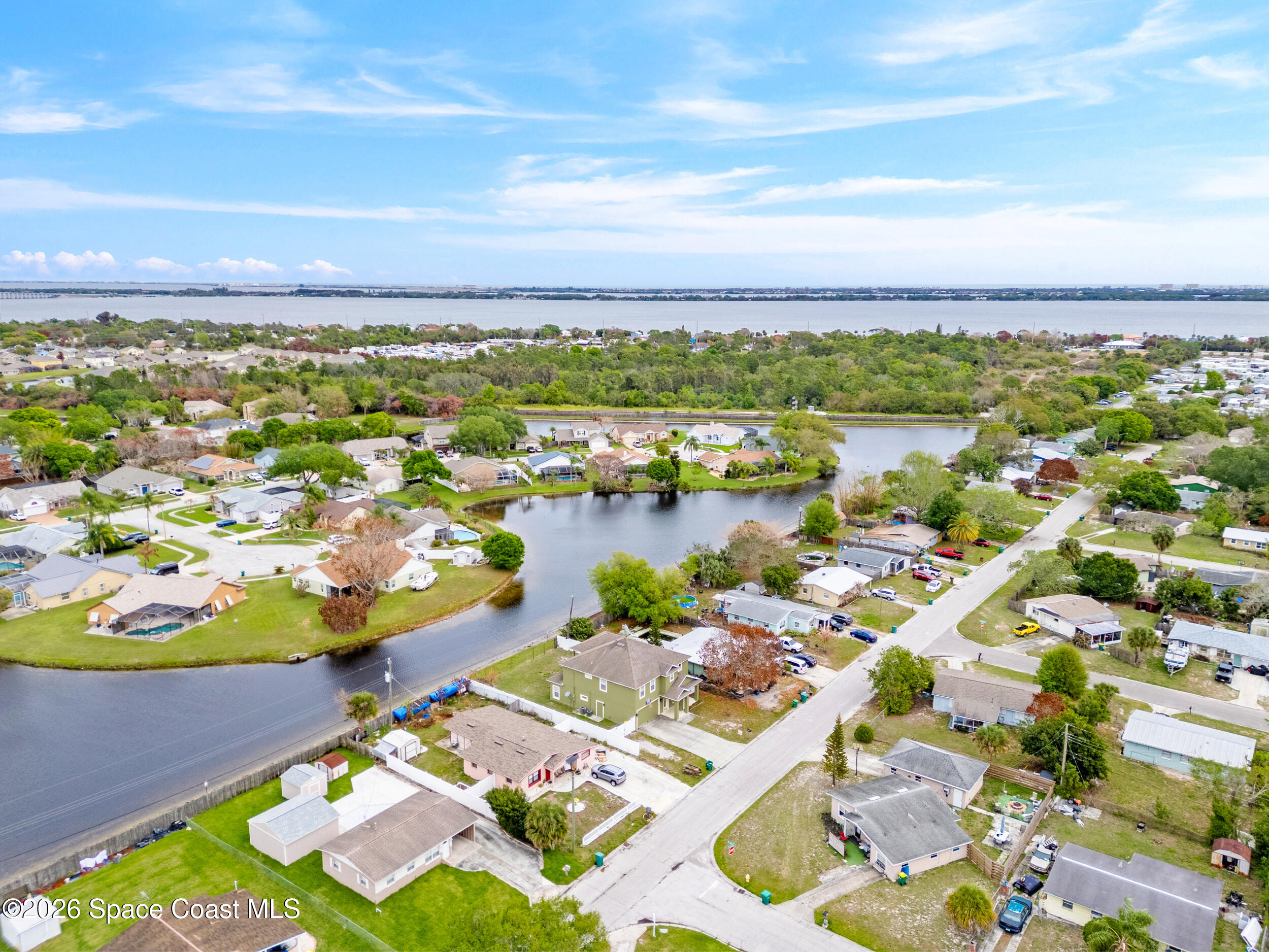 2246 Warwick Road Melbourne, FL 32935 - Photo 37 of 40 a view of a city with an ocean
