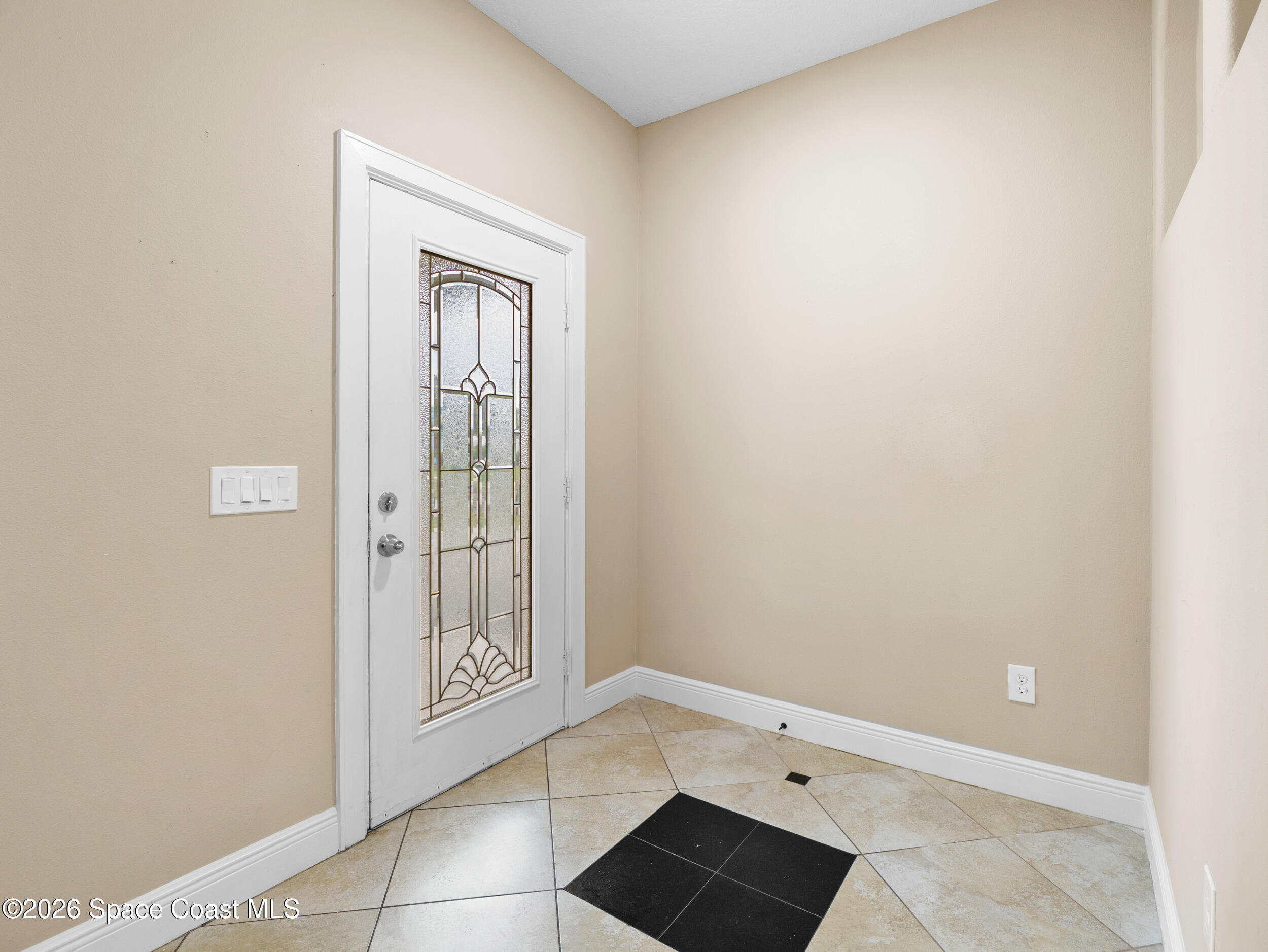 2246 Warwick Road Melbourne, FL 32935 - Photo 4 of 40 a view of an empty room