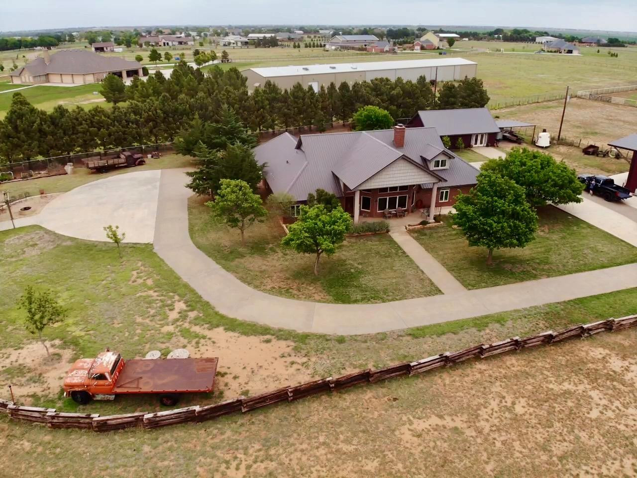9002 Woodrow Road Wolfforth, TX 79382 - Photo 45 of 48 an aerial view of a house with a ocean view