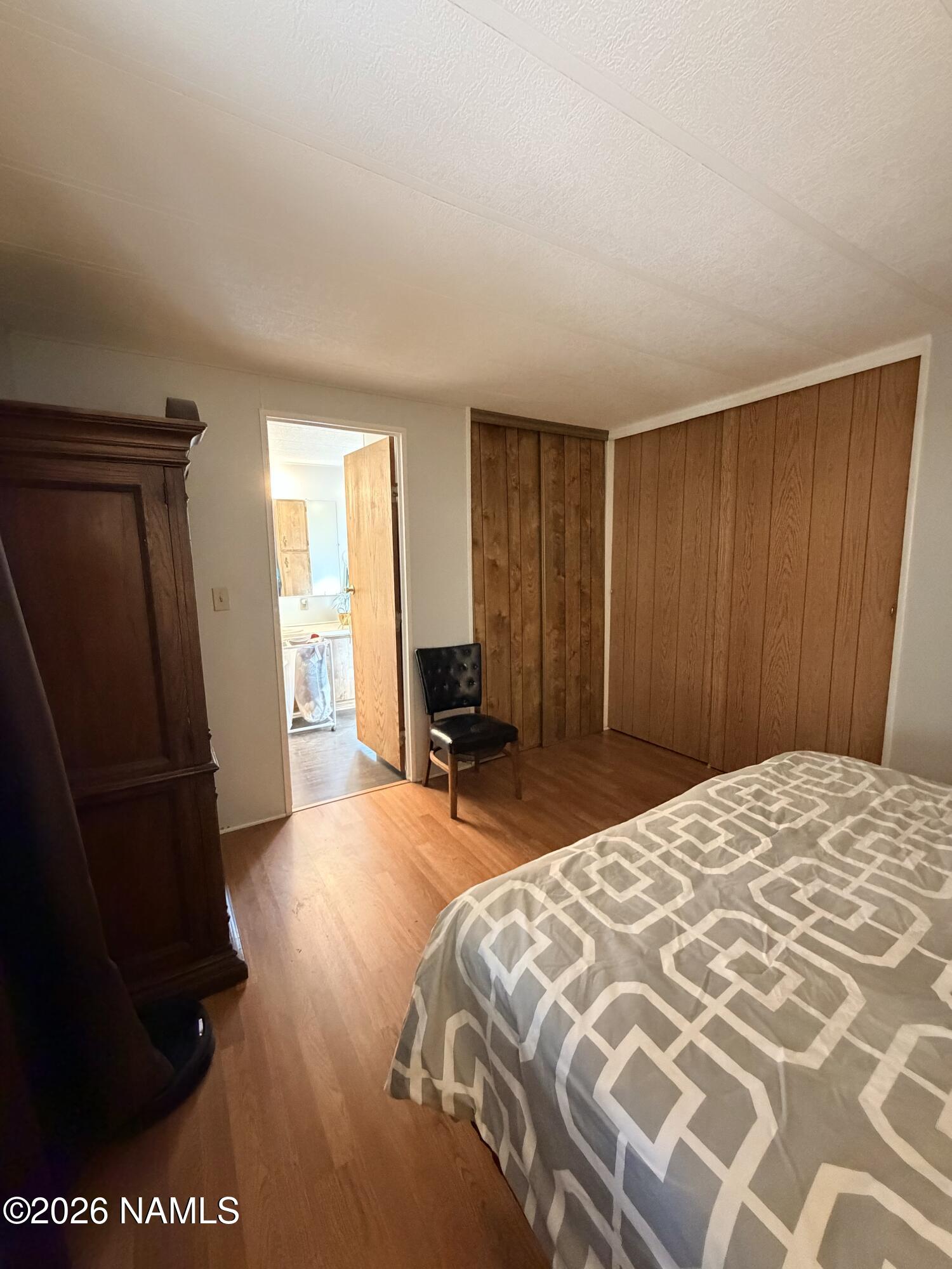2401 West Rte 66, Unit 43 Flagstaff, AZ 86001 - Photo 3 of 20 Primary bedroom w/ en suite bath