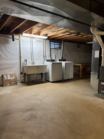 a view of room with furniture and a ceiling fan