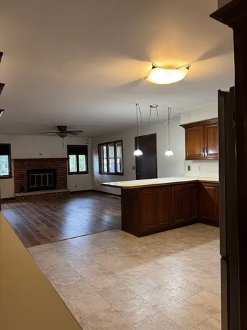 a kitchen with stainless steel appliances granite countertop a large counter top