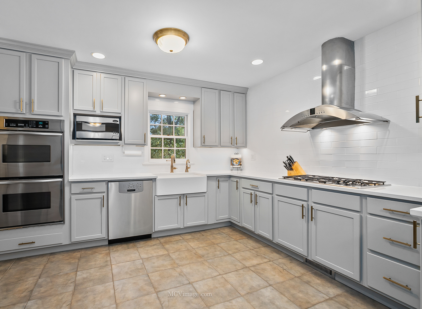 32W501 Derby Road Wayne, IL 60184 - Photo 10 of 28 a kitchen with granite countertop cabinets stainless steel appliances and a sink