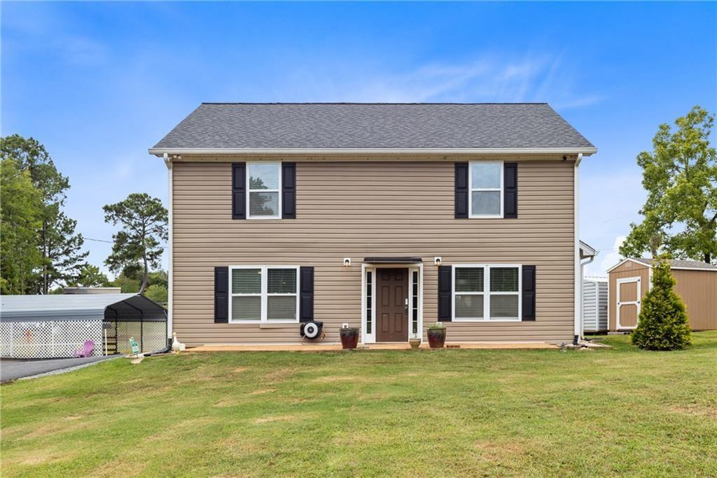 411 Cedar Creek Road Cartersville, GA 30121 - Photo 6 of 58 a front view of a house with a garden