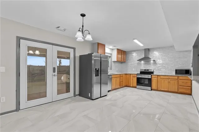 a view of an empty room with a glass door