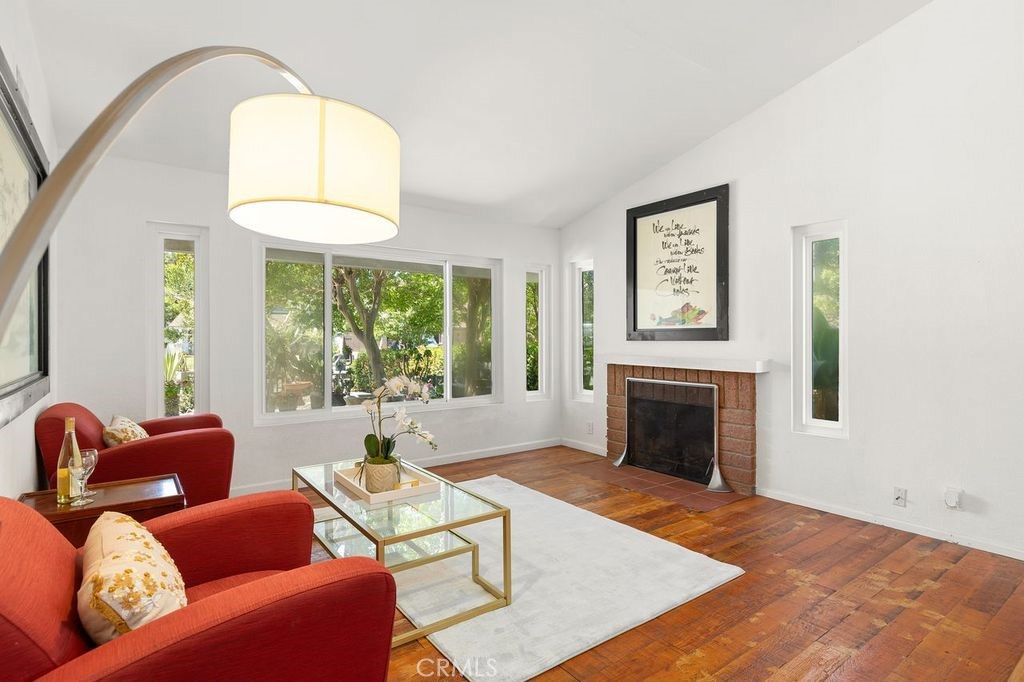 25495 Morningstar Road Lake Forest, CA 92630 - Photo 16 of 31 a living room with furniture and a fireplace