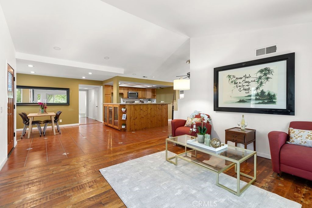 25495 Morningstar Road Lake Forest, CA 92630 - Photo 17 of 31 a living room with furniture and wooden floor