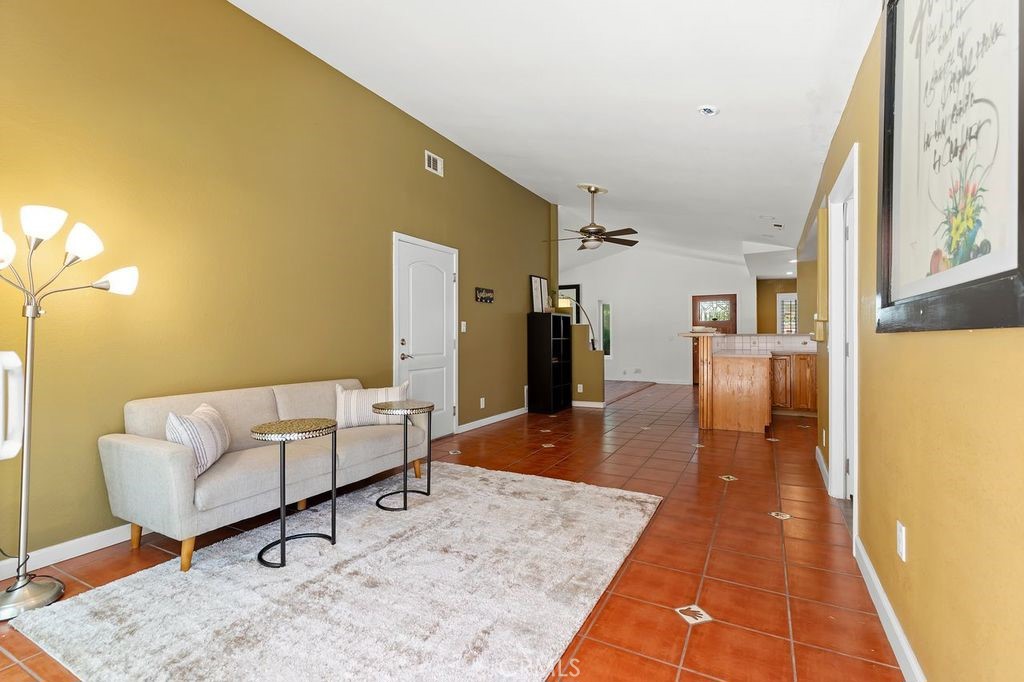 25495 Morningstar Road Lake Forest, CA 92630 - Photo 21 of 31 a living room with furniture and a rug
