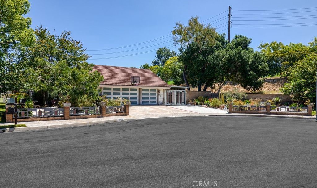 25495 Morningstar Road Lake Forest, CA 92630 - Photo 3 of 31 a view of a street with a building in the background