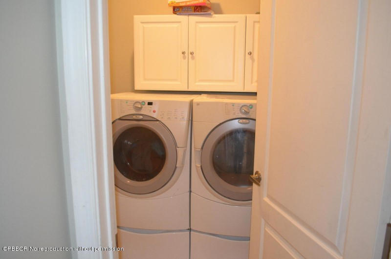 9506 Fox Trot Lane Boca Raton, FL 33496 - Photo 20 of 26 a utility room with dryer and washer