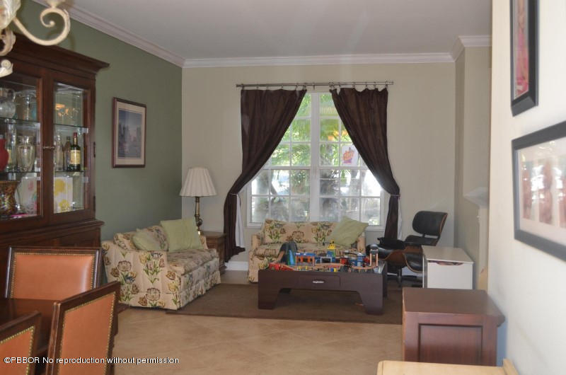 9506 Fox Trot Lane Boca Raton, FL 33496 - Photo 3 of 26 a living room with furniture and a large window