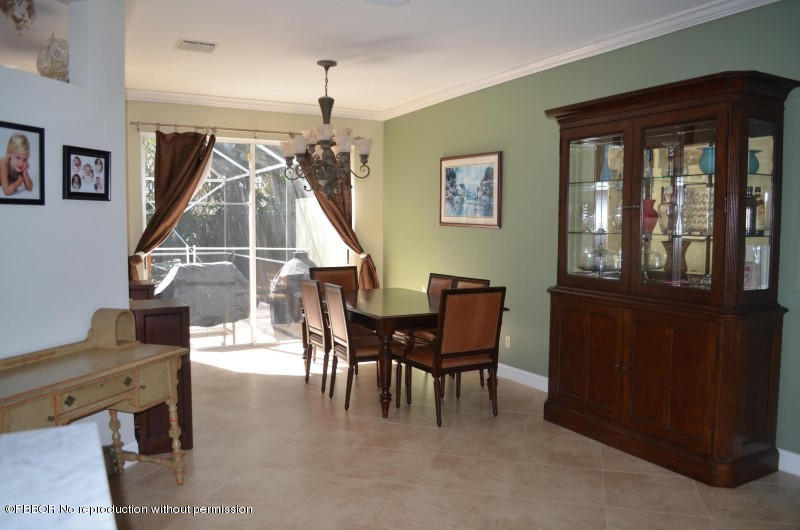 9506 Fox Trot Lane Boca Raton, FL 33496 - Photo 4 of 26 a dining room with wooden floor and breakfast area