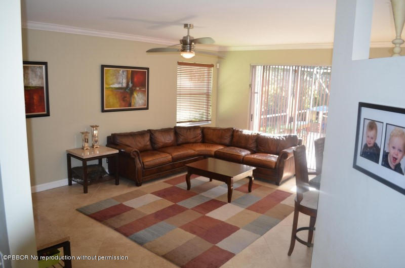 9506 Fox Trot Lane Boca Raton, FL 33496 - Photo 5 of 26 a living room with furniture and a window