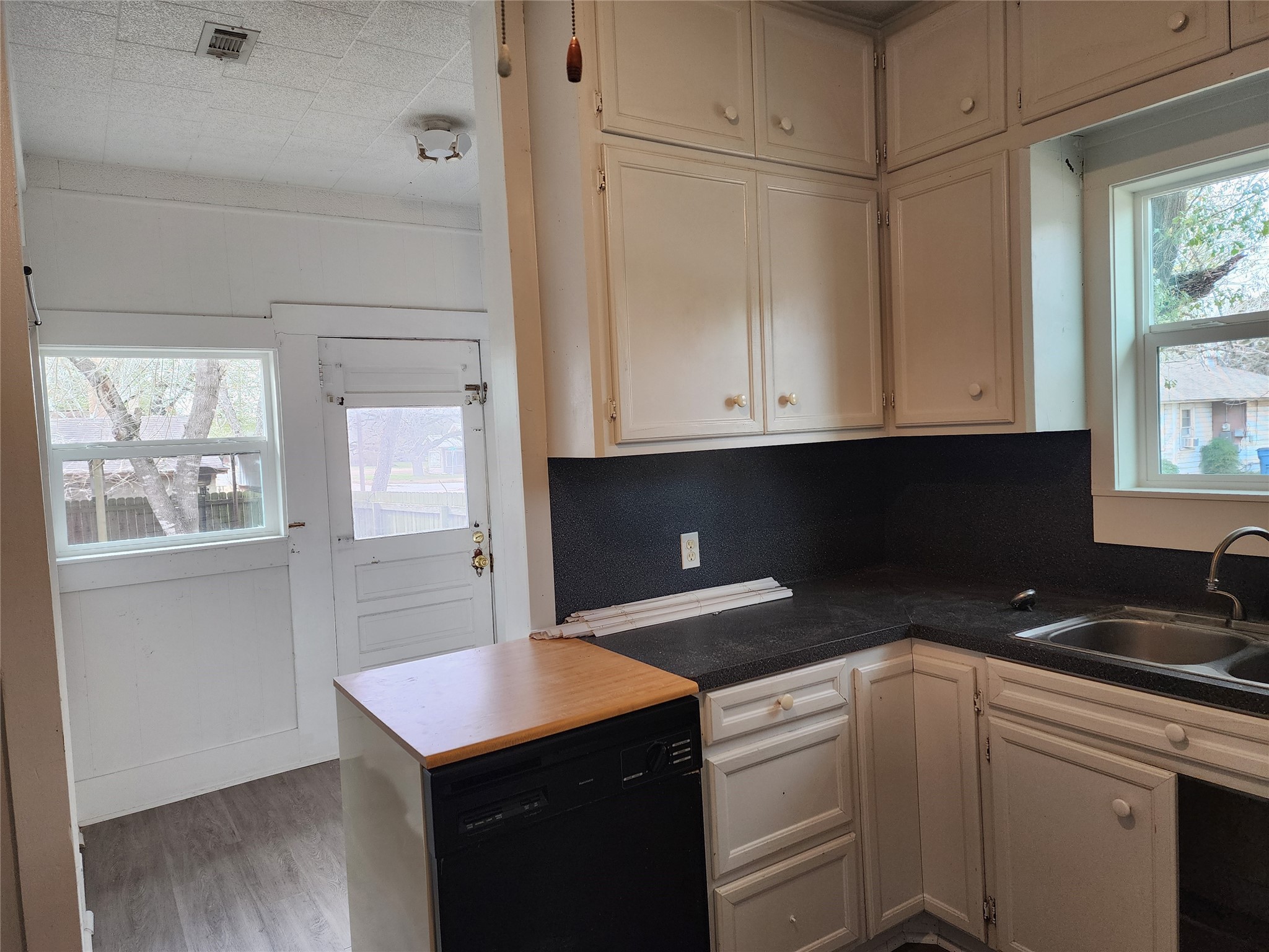 417 Victoria Street Navasota, TX 77868 - Photo 13 of 18 a kitchen with stainless steel appliances granite countertop a stove a sink and a microwave