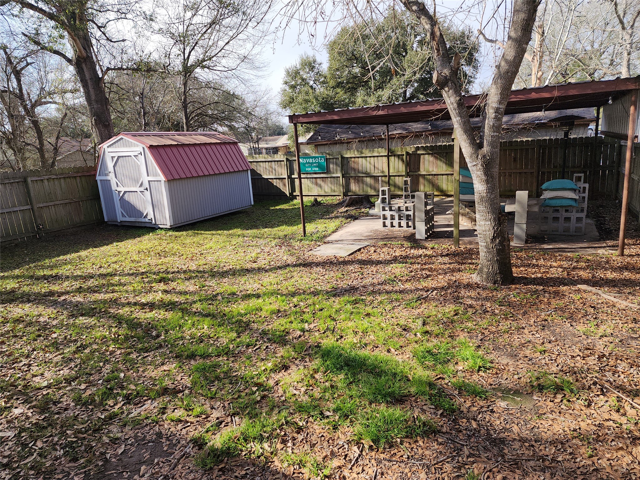 417 Victoria Street Navasota, TX 77868 - Photo 17 of 18 a house view with a backyard space