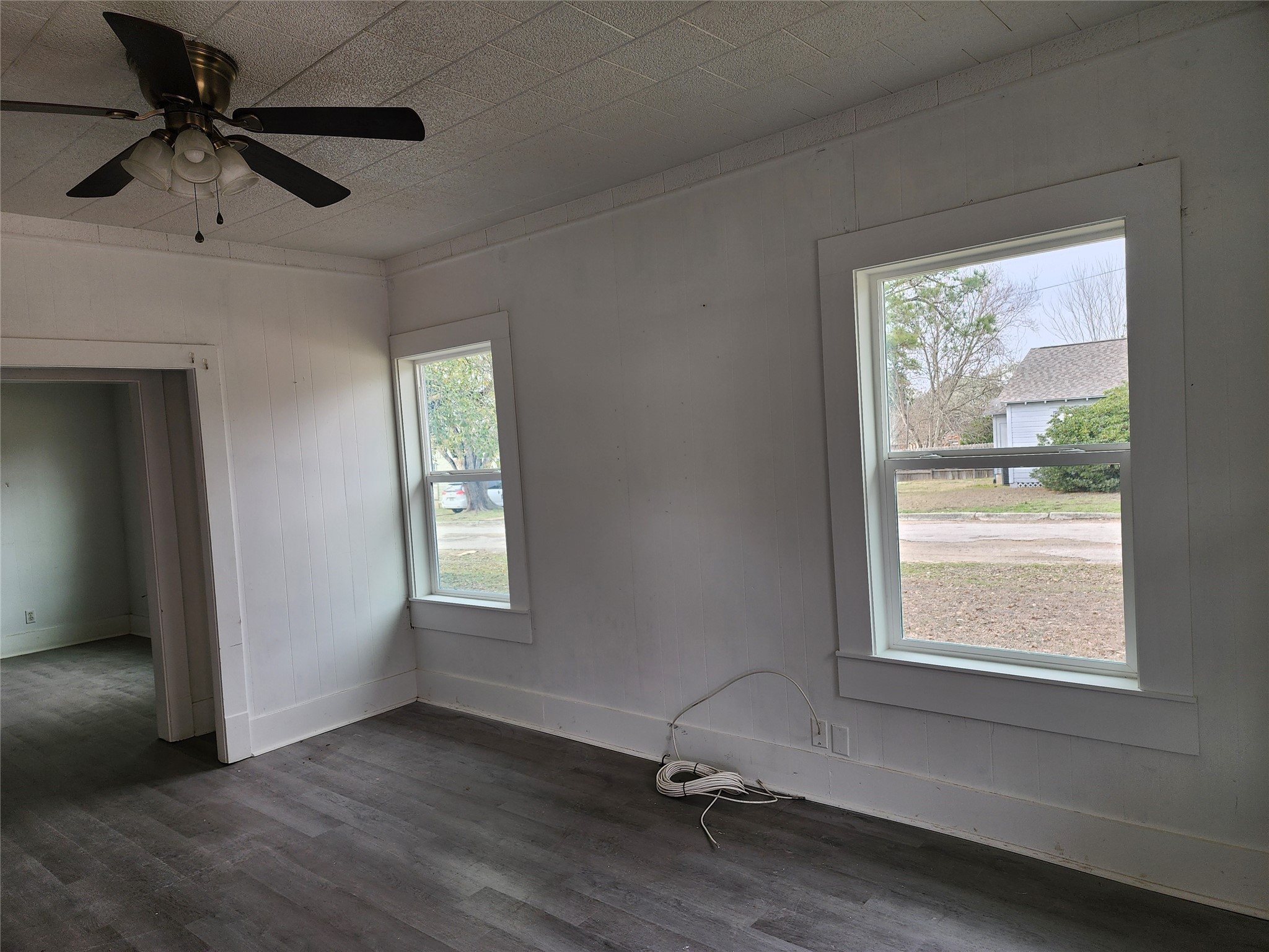 417 Victoria Street Navasota, TX 77868 - Photo 6 of 18 a view of a livingroom with a window and wooden floor