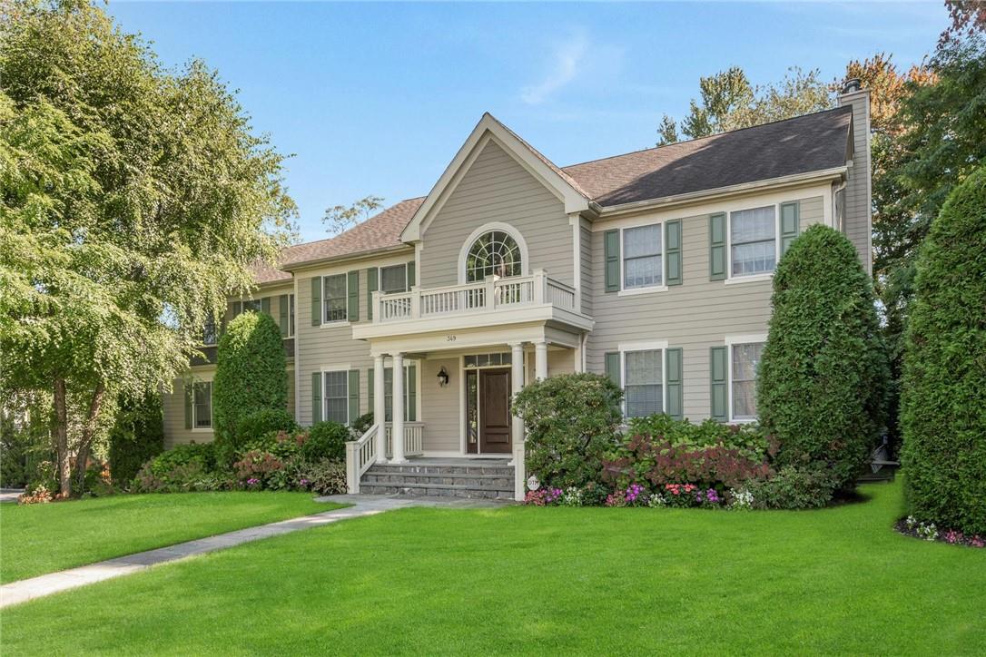 349 Oxford Road New Rochelle, NY 10804 - Photo 1 of 1 a front view of a house with a garden