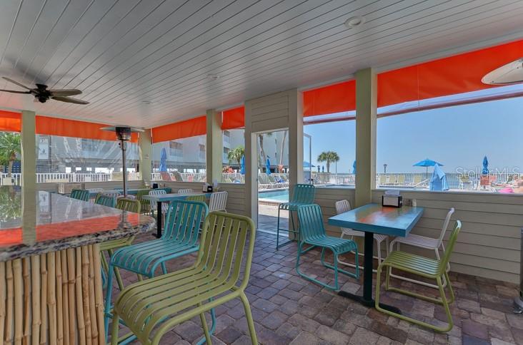 2506 North Rocky Point Drive, Unit 202 Tampa, FL 33607 - Photo 12 of 17 a outdoor space with patio the couches and chairs