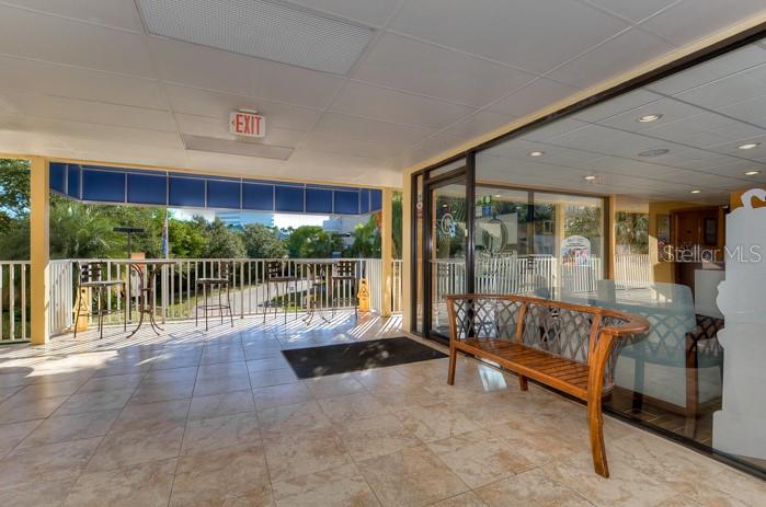 2506 North Rocky Point Drive, Unit 202 Tampa, FL 33607 - Photo 13 of 17 a view of a chairs and tables in the room