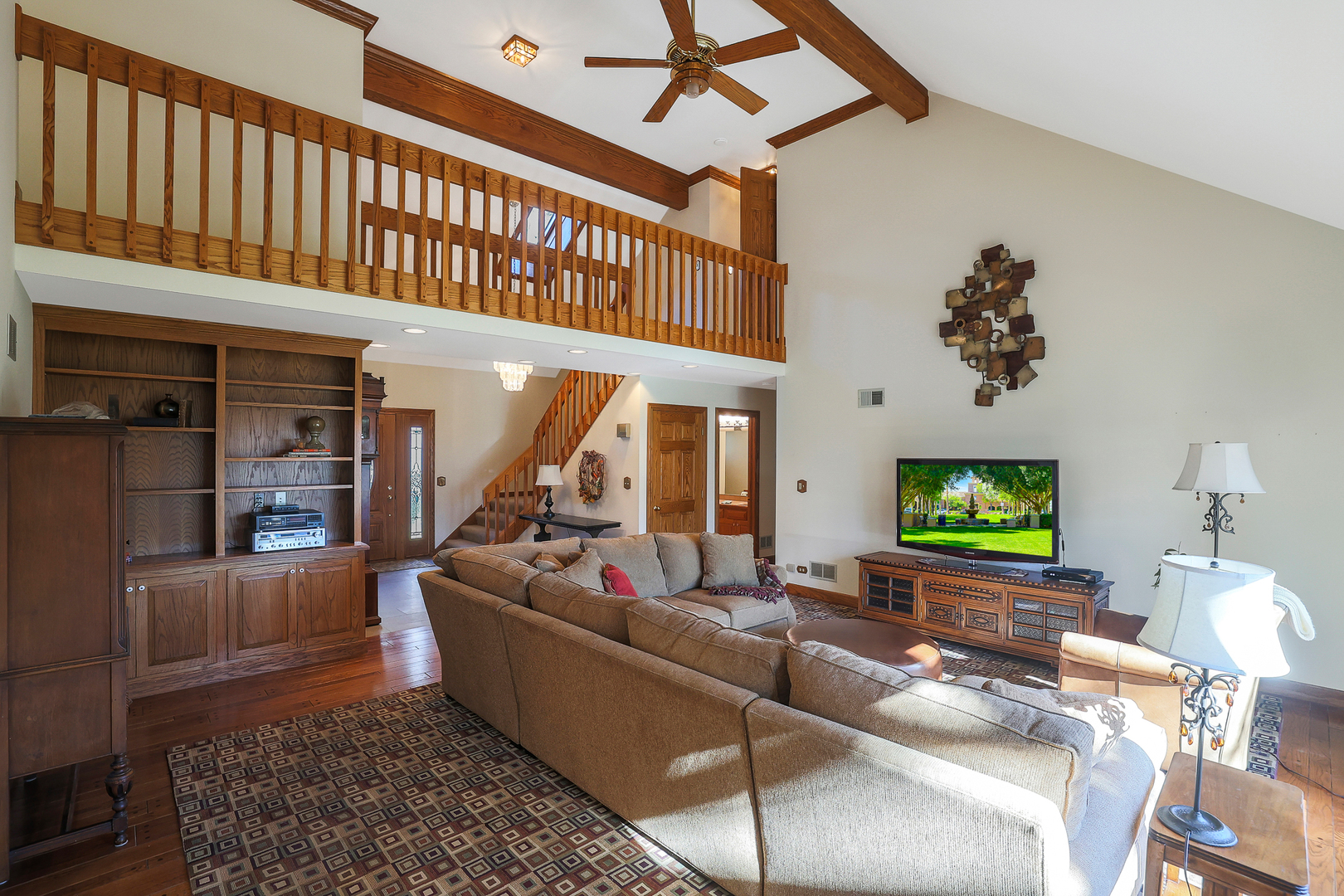 437 High Road Cary, IL 60013 - Photo 13 of 48 a living room with fireplace furniture and a flat screen tv
