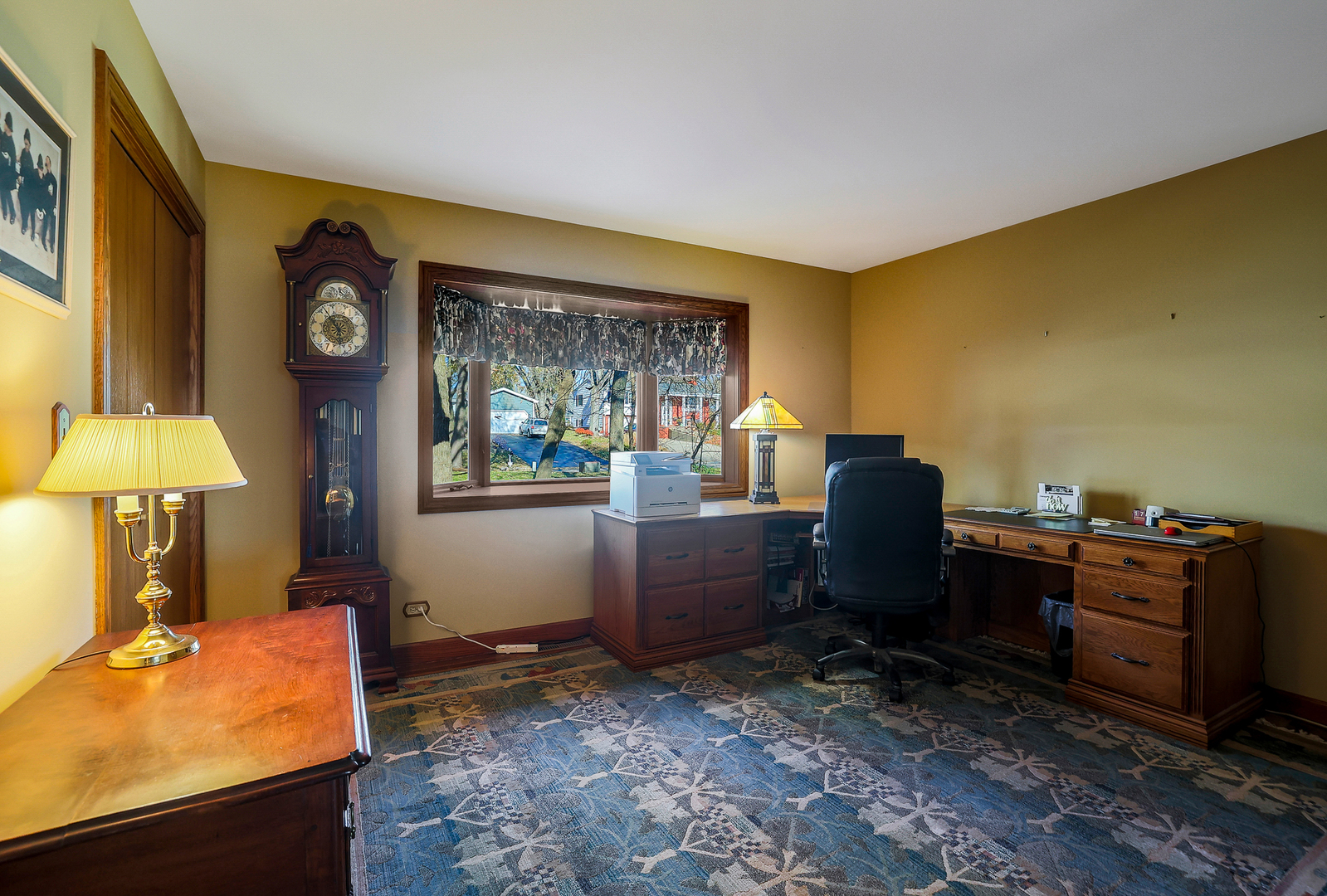 437 High Road Cary, IL 60013 - Photo 20 of 48 a workspace with furniture and a window