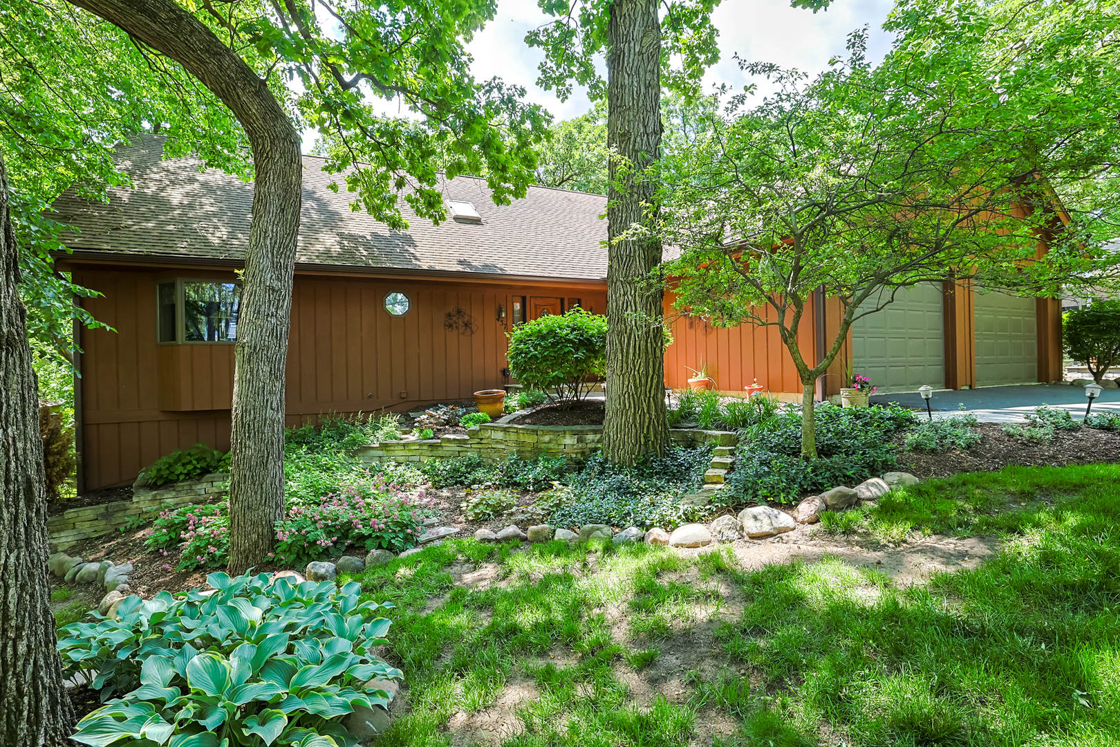 437 High Road Cary, IL 60013 - Photo 2 of 48 front view of a house with a yard