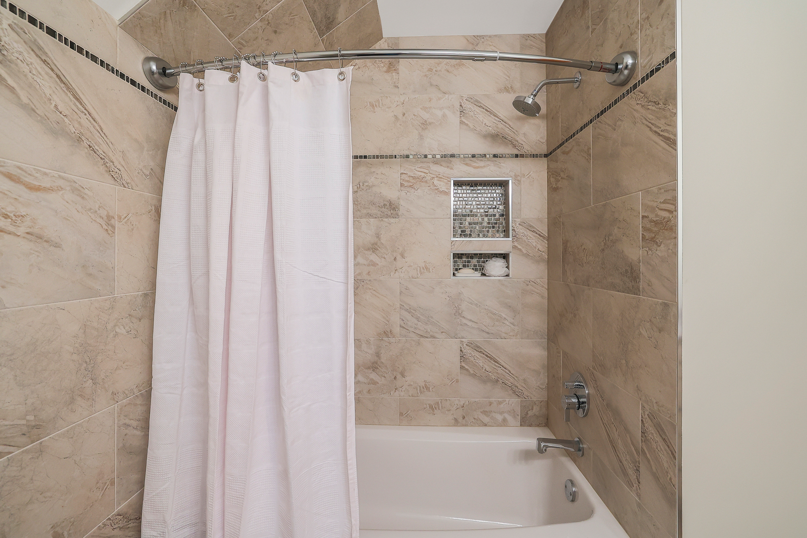 437 High Road Cary, IL 60013 - Photo 25 of 48 a bathroom with a shower and a bath tub