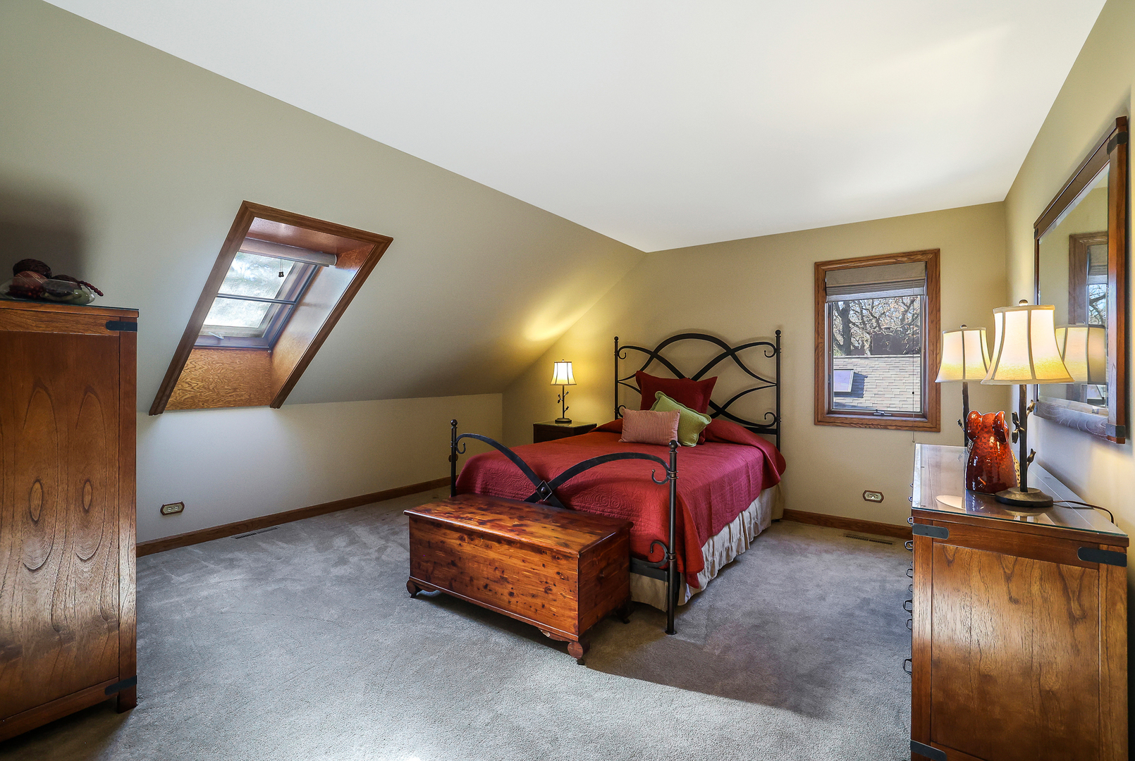 437 High Road Cary, IL 60013 - Photo 26 of 48 a bed room with a bed and a lamp