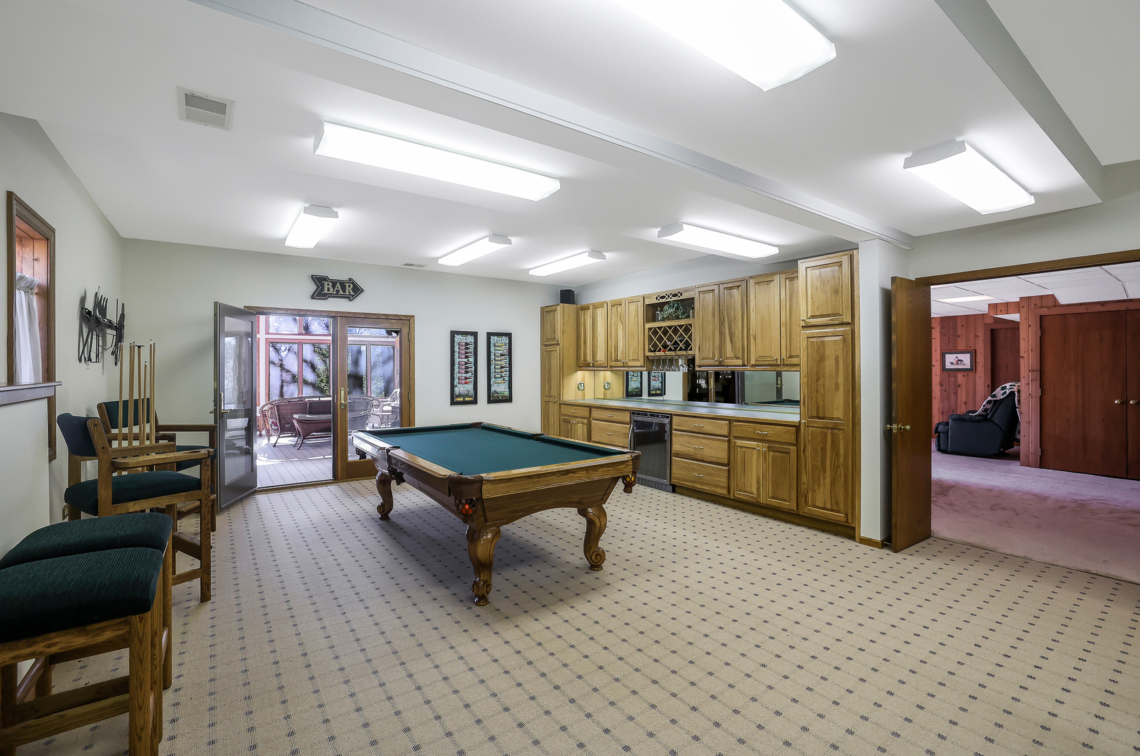 437 High Road Cary, IL 60013 - Photo 28 of 48 a living room with furniture and kitchen view