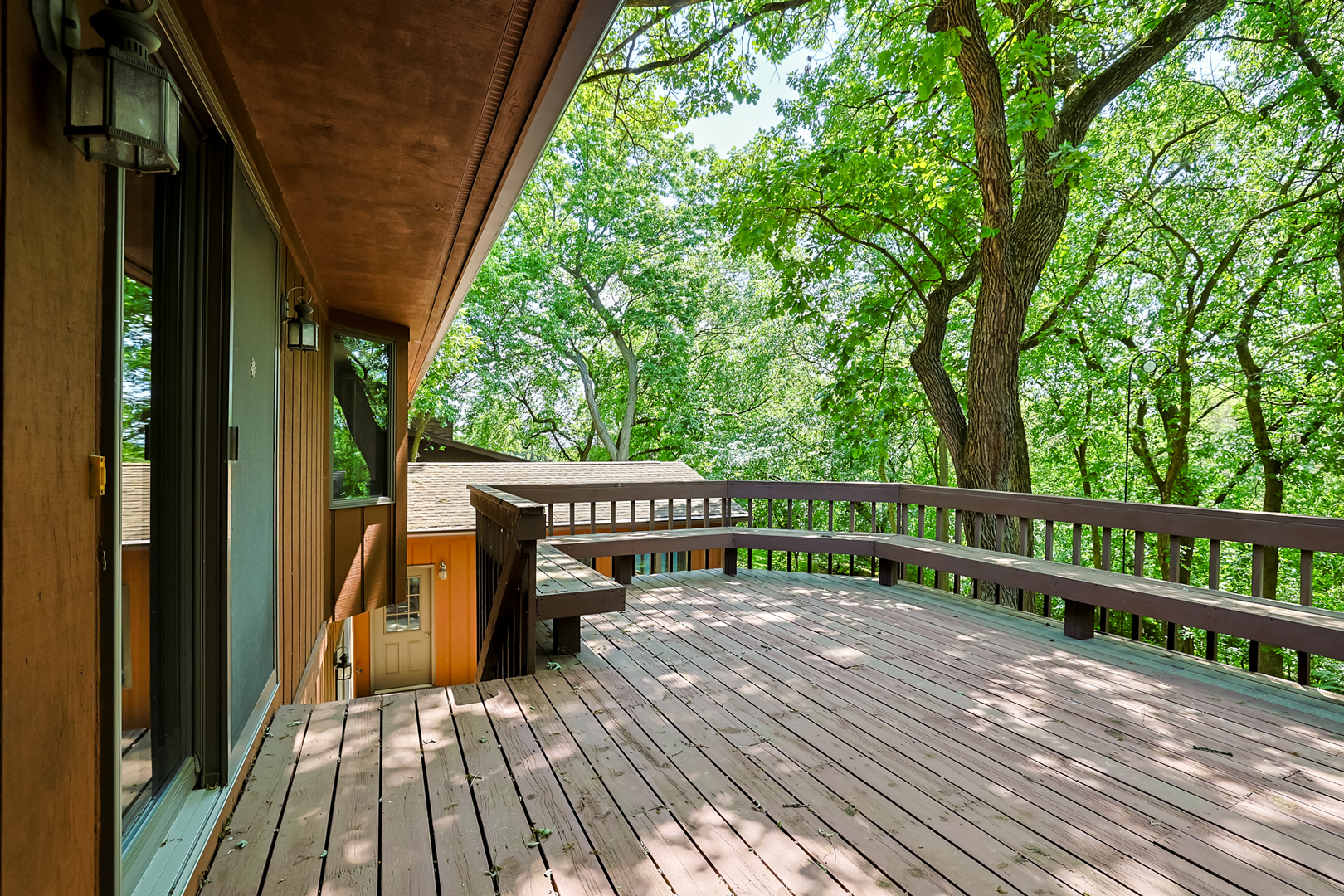 437 High Road Cary, IL 60013 - Photo 36 of 48 a view of balcony with wooden floor and fence