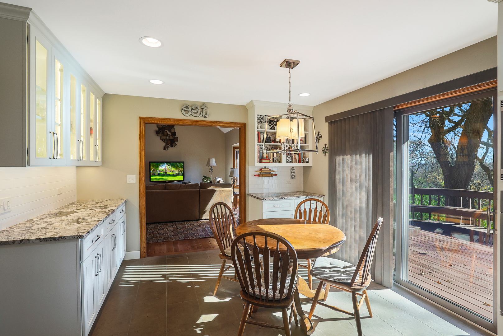 437 High Road Cary, IL 60013 - Photo 9 of 48 a view of a dining room with furniture window and outside view