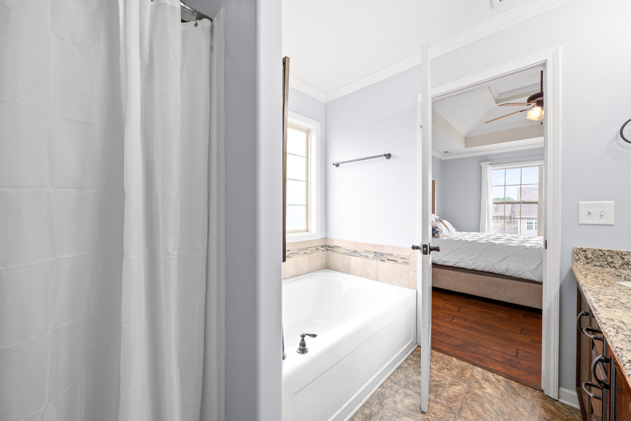 3756 Suiter Road Clarksville, TN 37040 - Photo 17 of 33 a bathroom with a tub and a sink
