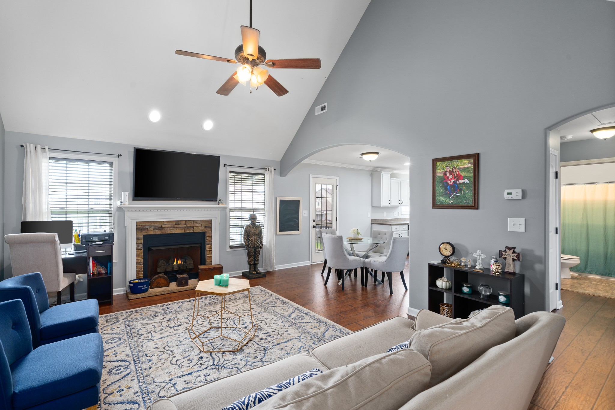3756 Suiter Road Clarksville, TN 37040 - Photo 4 of 33 a living room with furniture a rug and a fireplace