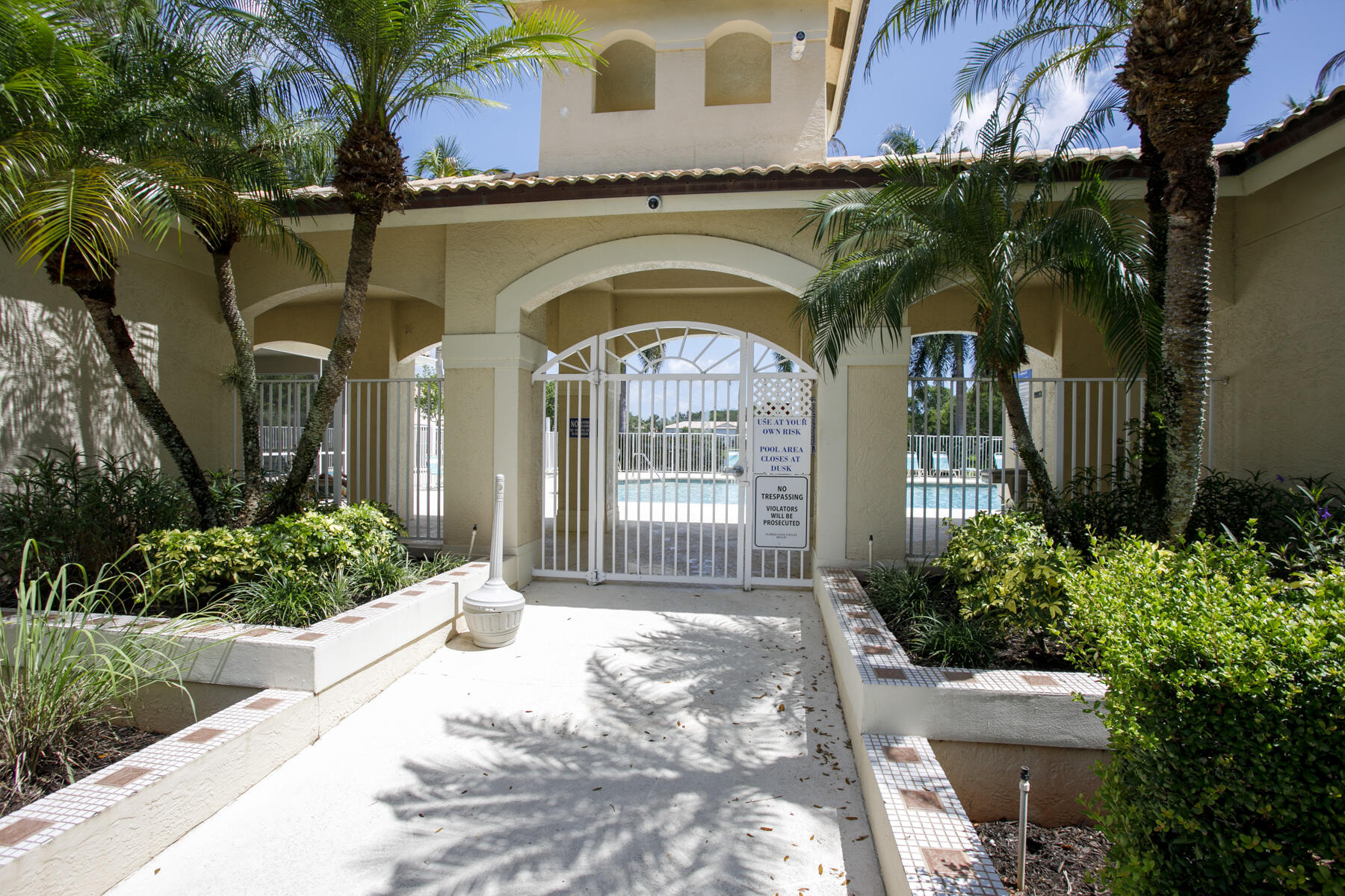 262 Timberwalk Trail Jupiter, FL 33458 - Photo 25 of 29 Pool Entrance